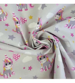 Motifs mignons pour ce tissu licorne rose très apprécié des fillettes