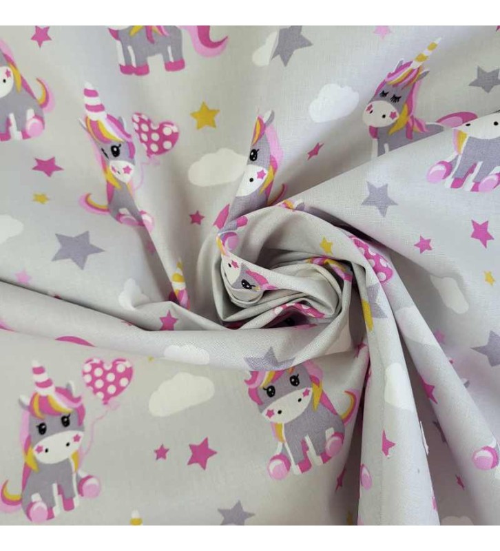 Motifs mignons pour ce tissu licorne rose très apprécié des fillettes